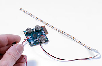LED strip with pin activated
